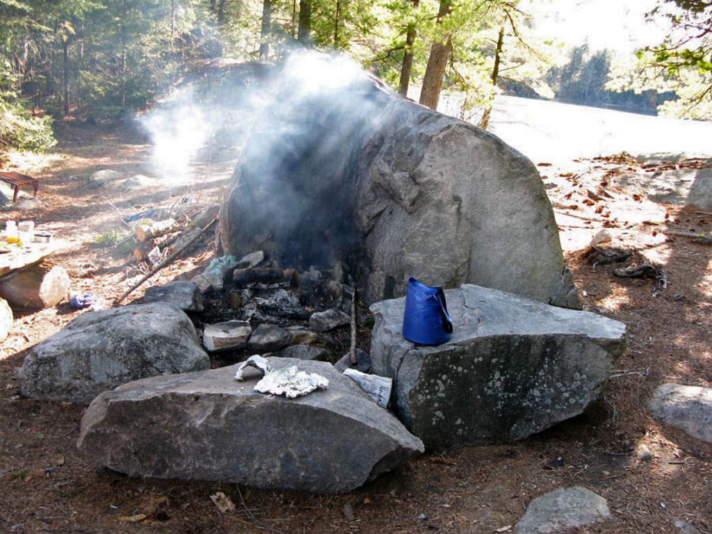 Algonquinadventures Com Bonnechere Lake Campsite 6 Campsite S Firepit Natural Boulder Windbreak Heat Reflector