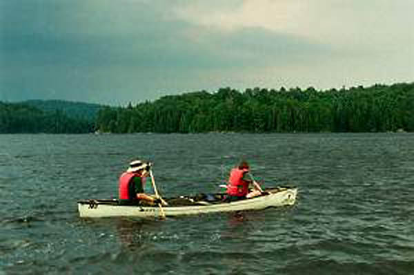 It was early afternoon and these canoeists were already having to deal with a strong and stormy westwind blowing across Louisa Lake.