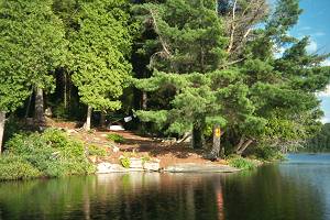 Located on Linda Lake, southeast point .. directly opposite the portage from Owl Lake.